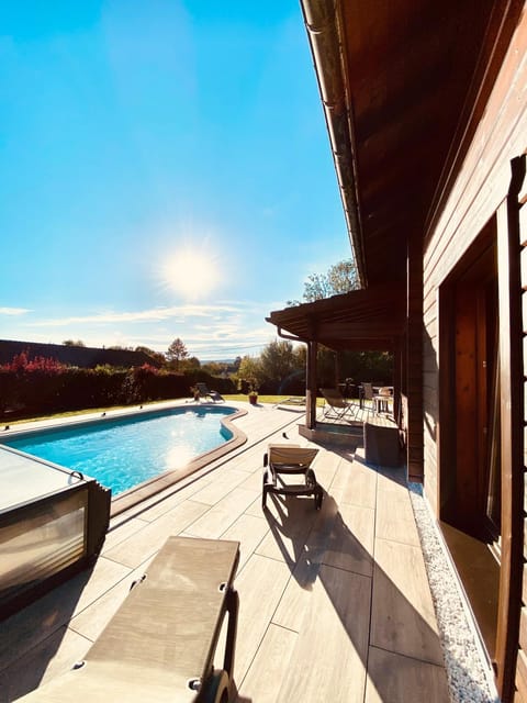 Property building, Living room, Swimming pool