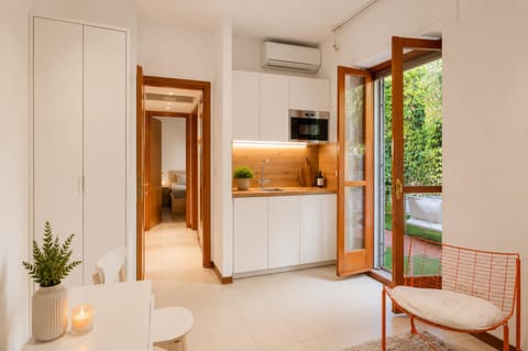 Balcony/Terrace, Living room, Dining area, dishwasher, microwave, stove, wardrobe, kitchen, air conditioner