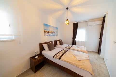 Photo of the whole room, Bedroom, towels, wardrobe, air conditioner