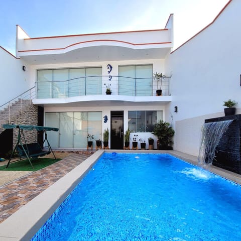 Property building, Patio, Day, Pool view, Swimming pool