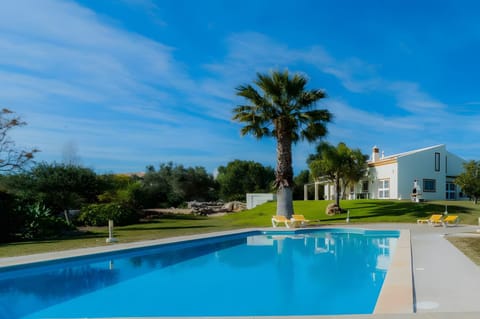 Property building, Living room, Swimming pool