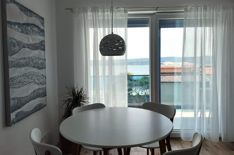 Natural landscape, Living room, Seating area, Dining area, Sea view, internet, internet, air conditioner, air conditioner