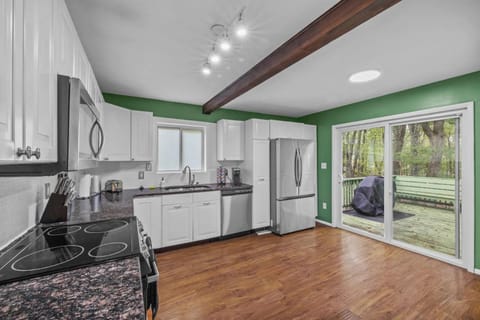 Kitchen or kitchenette, dishwasher, oven, stove, toaster