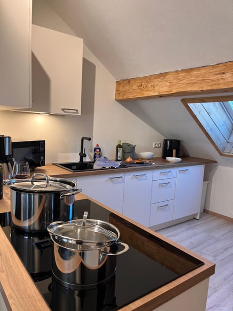 Kitchen or kitchenette, stove, toaster