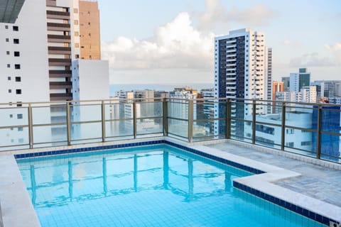 View (from property/room), City view, Landmark view, Sea view, Swimming pool