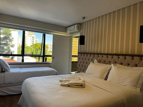 Bed, Photo of the whole room, Bedroom, towels, air conditioner