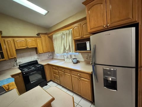 Kitchen or kitchenette, oven