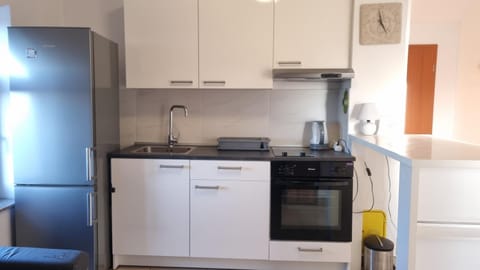 Kitchen or kitchenette, oven, stove
