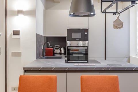 Kitchen or kitchenette, oven, stove