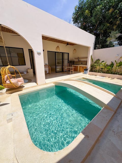 Property building, Patio, Day, Pool view, Swimming pool