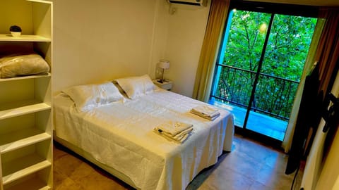 Bed, Photo of the whole room, Bedroom, towels, air conditioner
