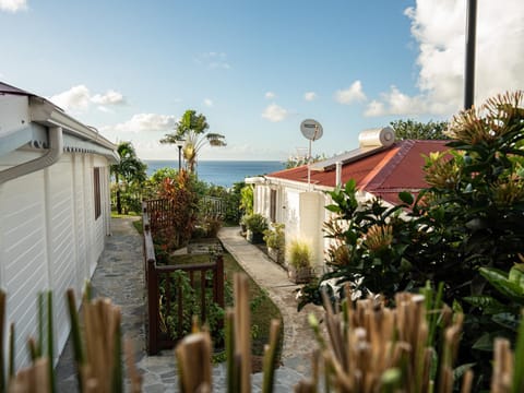 Property building, Restaurant/places to eat, Off site, Day, Natural landscape, Activities, BBQ facilities, Garden, Garden, Snorkeling, View (from property/room), View (from property/room), Beach, Canoeing, Hiking, Diving, Garden view, Garden view, Pool view, Pool view, Sea view, Sea view, Swimming pool, Sunrise, Sunset, Inner courtyard view, acessibility