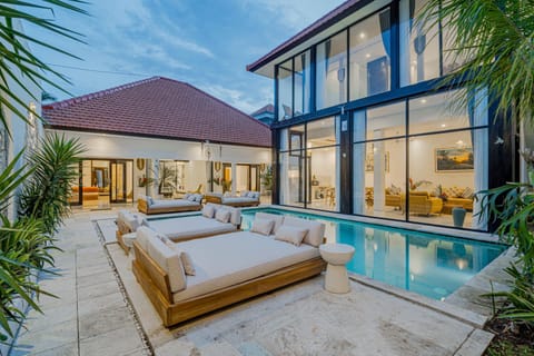 Property building, Natural landscape, Living room, Pool view, Swimming pool, sunbed