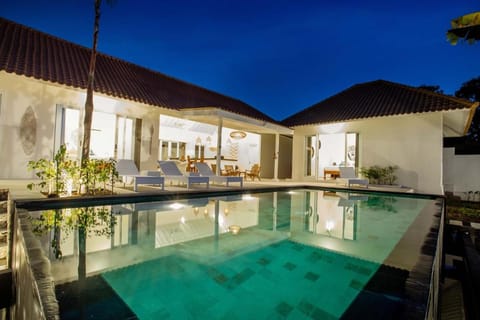 Property building, Patio, Night, Pool view, Swimming pool, sunbed