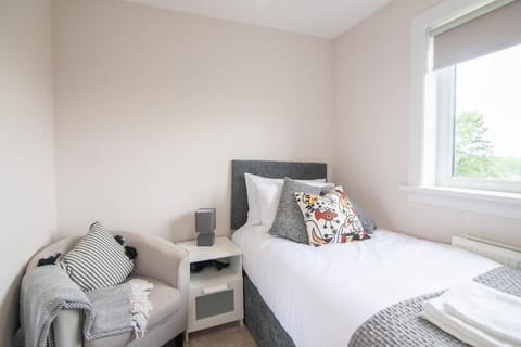 Bed, Decorative detail, Decorative detail, Bedroom, hair dryier, towels, towels