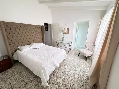 Bed, Photo of the whole room, Bedroom, hair dresser, towels, air conditioner