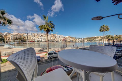 Property building, Patio, Day, Natural landscape, View (from property/room), Balcony/Terrace, Living room, Seating area, Dining area, City view, Sea view