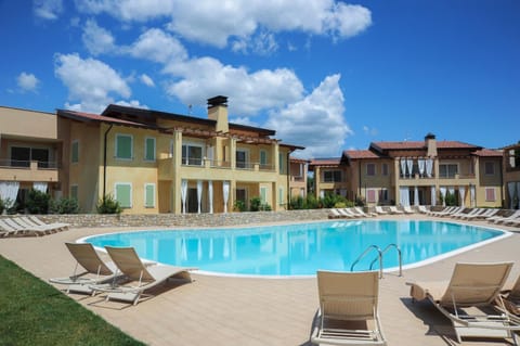 Property building, Swimming pool, sunbed