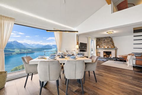 Natural landscape, TV and multimedia, Living room, Seating area, Dining area, Evening entertainment, Lake view, Mountain view, fireplace