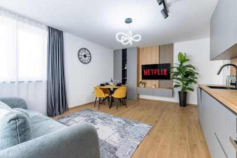 Kitchen or kitchenette, Living room, Seating area, Dining area