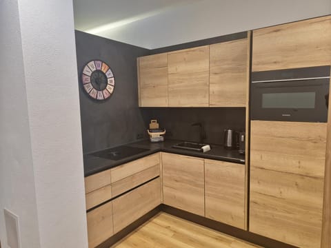 Kitchen or kitchenette, stove