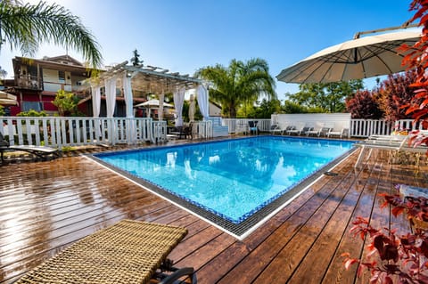 Property building, Patio, Pool view, Swimming pool
