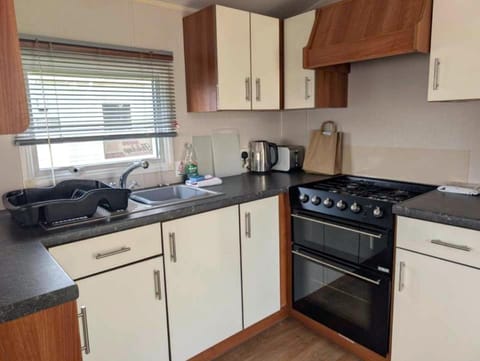 Kitchen or kitchenette, oven, stove, toaster