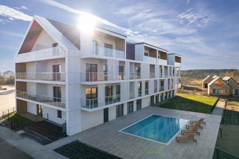 Property building, Natural landscape, Pool view, Swimming pool