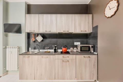 Kitchen or kitchenette, stove