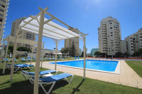Property building, Living room, Swimming pool
