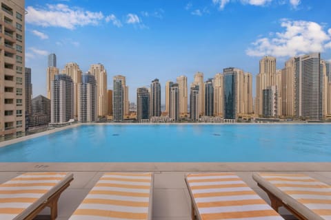 Property building, Day, Natural landscape, City view, Pool view, Swimming pool, sunbed