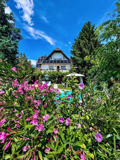 Property building, Day, Natural landscape, Garden, Garden view, Pool view, Swimming pool