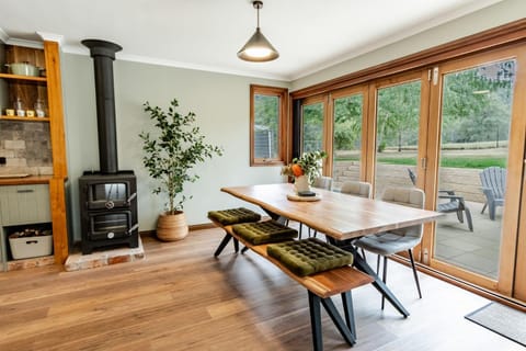 Patio, Living room, Seating area, Dining area, Garden view, fireplace, heating, oven, air conditioner