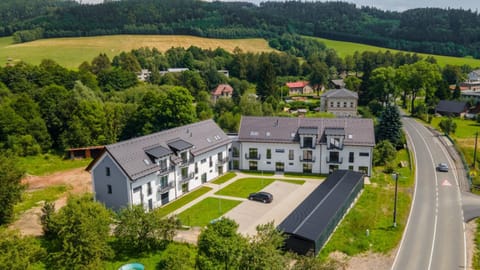 Property building, Spring, Day, Neighbourhood, Natural landscape, Bird's eye view, Street view, Location, Parking
