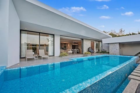 Property building, Pool view, Swimming pool, sunbed