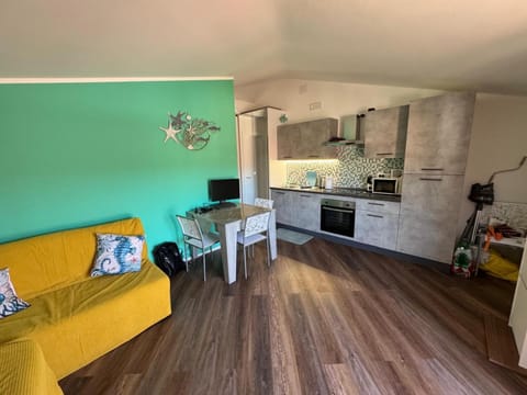 Kitchen or kitchenette, Living room, Seating area, Dining area, oven, stove, toaster