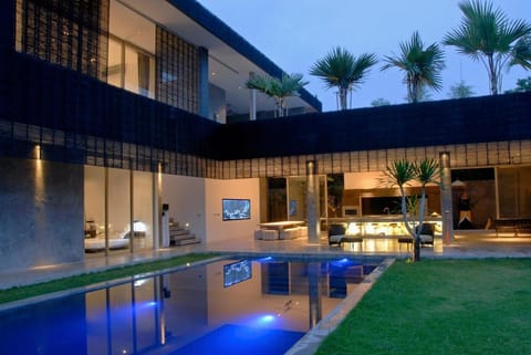 Property building, Patio, Night, Garden, Seating area, Garden view, Pool view, Swimming pool