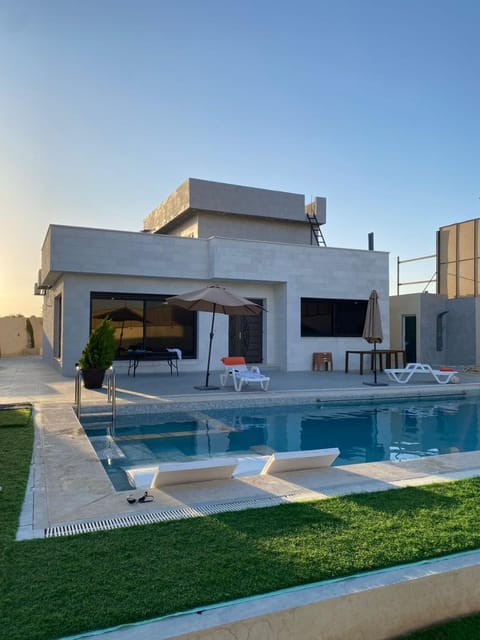 Property building, Day, Pool view, sunbed
