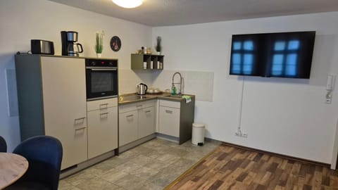 Kitchen or kitchenette, oven, stove