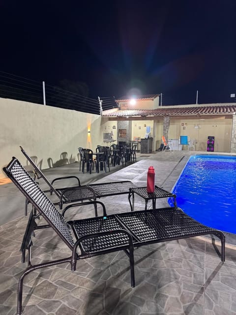 Patio, Night, Pool view, Swimming pool, sunbed