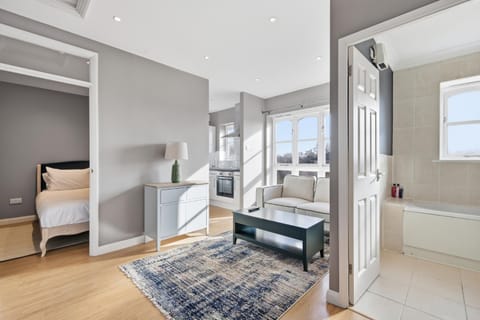 Bed, Living room, Seating area, Bedroom