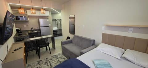 Bed, TV and multimedia, Kitchen or kitchenette, Living room, Photo of the whole room, Dining area