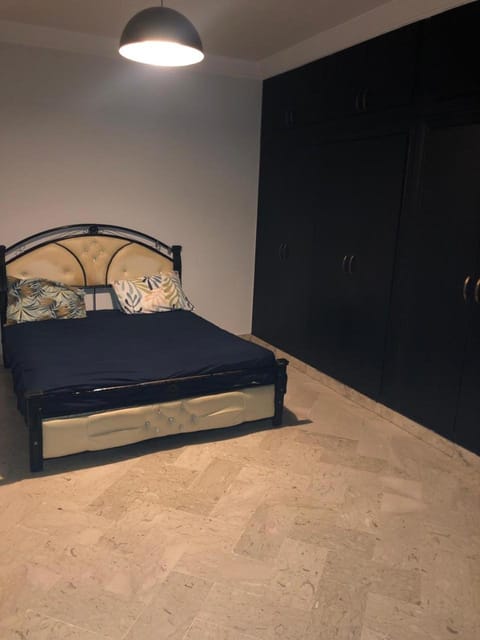 Bed, wardrobe