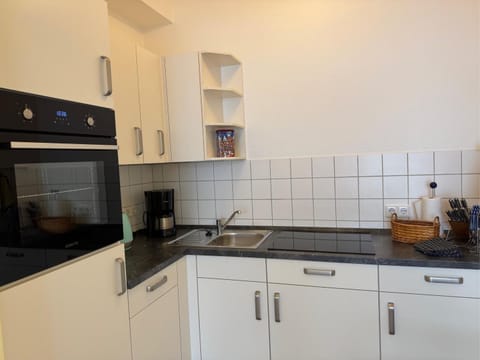 Kitchen or kitchenette, stove, kitchen