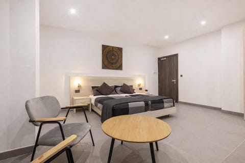 Bed, Seating area, Bedroom