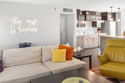 Kitchen or kitchenette, Living room, Seating area, furniture, microwave, air conditioner