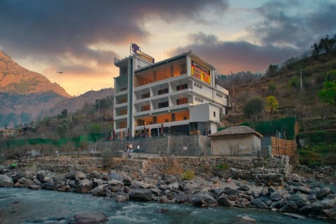 Property building, Natural landscape, Mountain view, River view