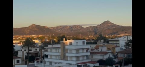Property building, Nearby landmark, Natural landscape, Mountain view