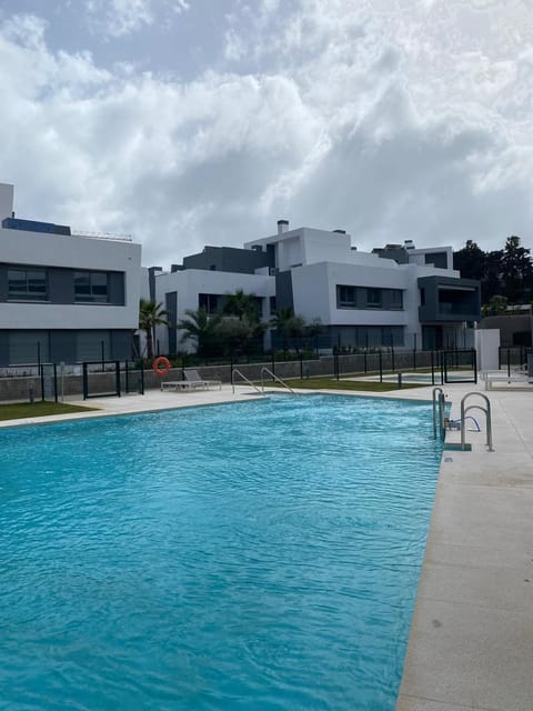 Property building, Swimming pool, Swimming pool, sunbed