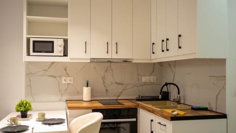 Kitchen or kitchenette, stove